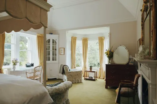 Lochside Luxury: Historic Home with Stunning Scottish Woodland Views