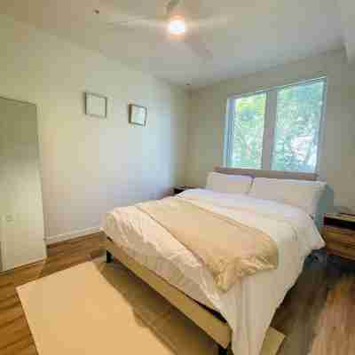 High-Rise and Luxury Suite: Cozy + Central Rooms