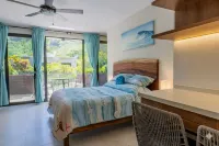 Cozy studio apartment near beach with roof top pool, AC, WiFi