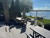 Experience Lake Life at Our 3-Bedroom Beachfront Cottage, Near Grand Rapids.