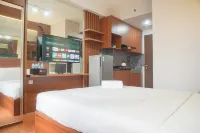 Relaxing and Homey Studio Transpark Cibubur Apartment By Travelio