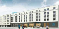 Q Hotel Plus Katowice Hotels near Cemetery chapel of Saints Apostles Peter and Paul Parish on Sienkiewicza Street in Katowice