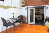 PORTHOLE:  Peaceful with a private, locked, covered patio to relax/ store bikes.