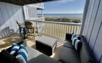 Luxury Oceanfront condo, sleeps 4, private beach access, pool and amazing views.