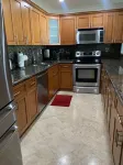 Entire condominium with a pool view, steps from the beach