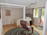 Beautifully appointed lake-view cottage with dock access