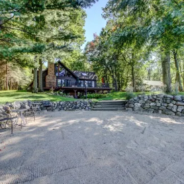 Whitefish Chain Lake Home with Beach + Sauna + King Beds + Kayaks +Paddle Boards
