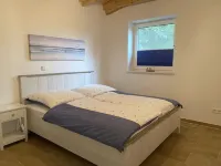 "Ankerplatz" vacation apartment with large garden in the heart of Pilsum - 4 stjerner