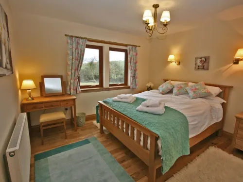 Luxury lodge situated idyllically on the edge of a small working farm