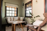 Japanese timberframe tiny house perched on side of Lookout Mountain