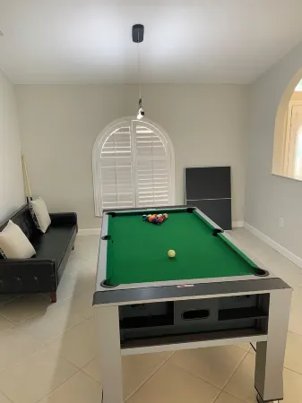 MAGNIFICENT! LUXURY WATERFRONT HOME;BIG HEATED POOL-80’ DOCK! 5 MIN FISH VILLAGE