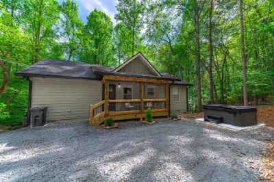 Cozy Boho Cabin with Hot Tub and Resort Amenities Access Hotels near Parks Place Convenience Store