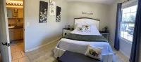 Farmhouse Charm in a Newly Renovated Lake View Walkout Condo! Marina 5 Min Away!