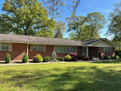 Beautiful large home on Lake Chickamauga at Dallas Bay with private boat ramp.
