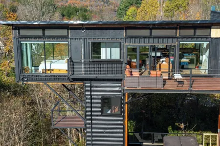 Amazing 34 foot high shipping container home in Whitingham on Sadawga Lake