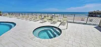 Beautiful Oceanside Condo with Beach Access and NEW Pool/Hot tub
