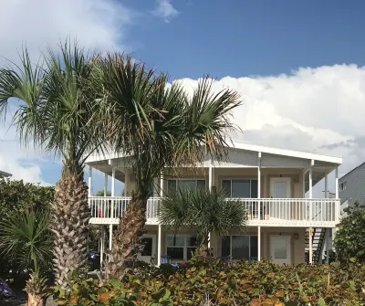 Beach, Sand, Sunsets. . . Rocking chair in front of the porch!