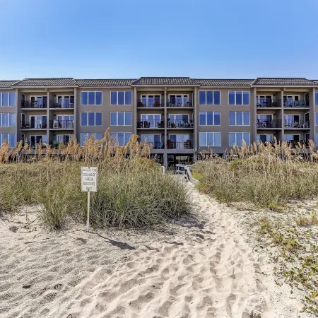 Oceanfront Beach Escape Condo with WiFi by RedAwning