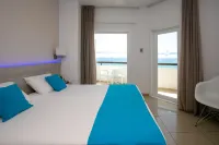 Les Palmiers Beach Boutique Hotel & Luxury Apartments
