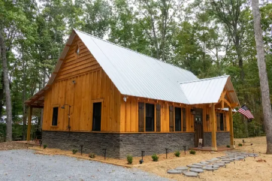 Charming Cabin Retreat with Hot Tub and Outdoor Games - Cozy Escape