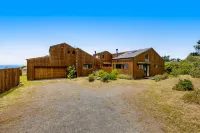 Stunning home with sweeping ocean views, private hot tub & outdoor living