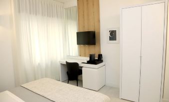 Lo Studio di Viale Lo Re Camere & Caffe’