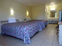 Super 6 Inn & Suites - parkir