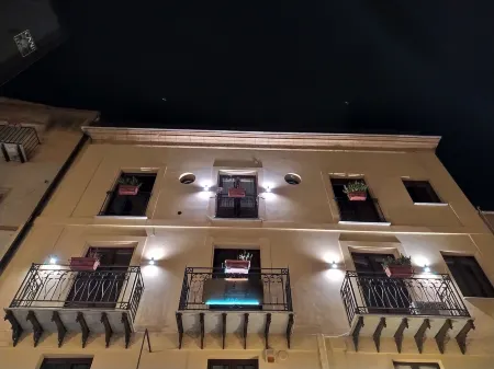 Atenea Luxury Suites - Atenea Collection Отели рядом с достопримечательностью «Храм Зевса Олімпійського»