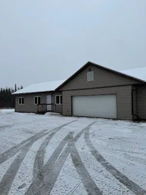 Aurora viewing 3BR/2BA home, plus heated 2 car garage, North Pole, AK.