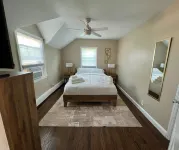 Stylish yet cozy experience at this centrally-located place in Patchogue. - Apartments
