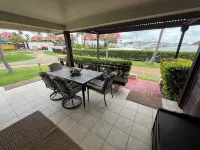 Paradise Awaits! Ground level unit with incredible views, pool, & beach access!