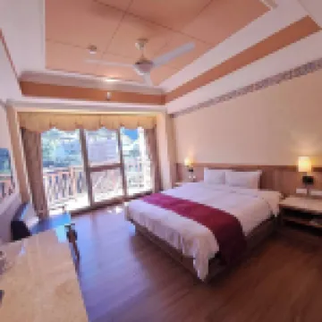 Ku Kuan Hotspring Hotel Hoteles cerca de Wuling Farm