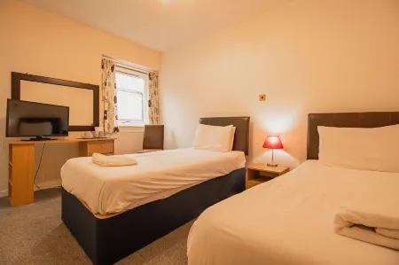 The Ben Mhor Hotel, Bar & Restaurant Отели в г. Грантаун-он-Спей