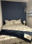 Charming shipping container home with lake view and boat ramp.