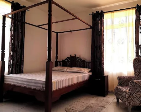 Centrally located 2-bedroom apartment/WiFi & basement parking in vibrant Mombasa
