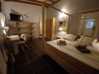 Air-conditioned studio with terrace in attractive colonial villa with swimming pool