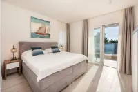 Villa 01 - Apartment 4 (4 + 2, 2nd floor) Hotels in Promajna