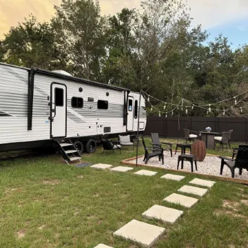 Cozy RV Retreat with Private Hot Tub and Fenced Yard