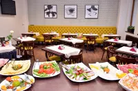 Hotel Capitolina City Chic - Desayuno