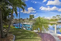Canal Waterfront Home with Private Pool and Dock! - parking