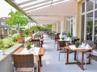 Radisson Blu Park Hotel & Conference Centre, Dresden Radebeul Отели рядом с достопримечательностью «Клотче»