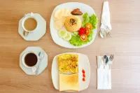 เลอกรีนสวีท ราตูลางี โรงแรมใน