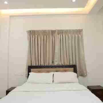 Belle-Vue Holiday Homes - 1BHK Apartments Rooms