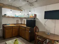 A Minimalist Fancy!  A cute place to lay your head and take a short shower.