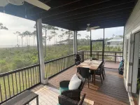 Captivating Bay Front home with stunning sunsetsNew dock/kayak launch in 2025!