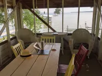Classic Green Lake cottage, lakefront, screened boathouse deck, dock, swimming Hotels in Green Lake County
