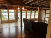 Beautiful private beach area within steps from the modern updated log home