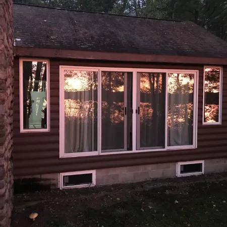 Lakefront cabin with spectacular sunsets included