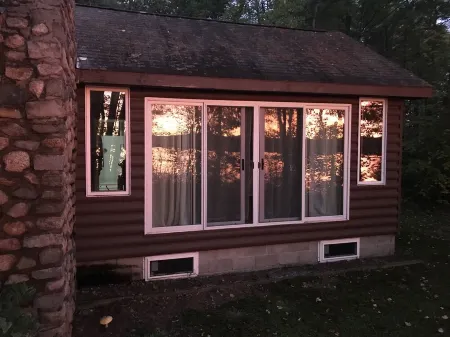 Lakefront cabin with spectacular sunsets included