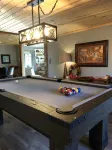 Cozy 2 bedroom cabin with fireplace steps to sand bottom swimming and lake views